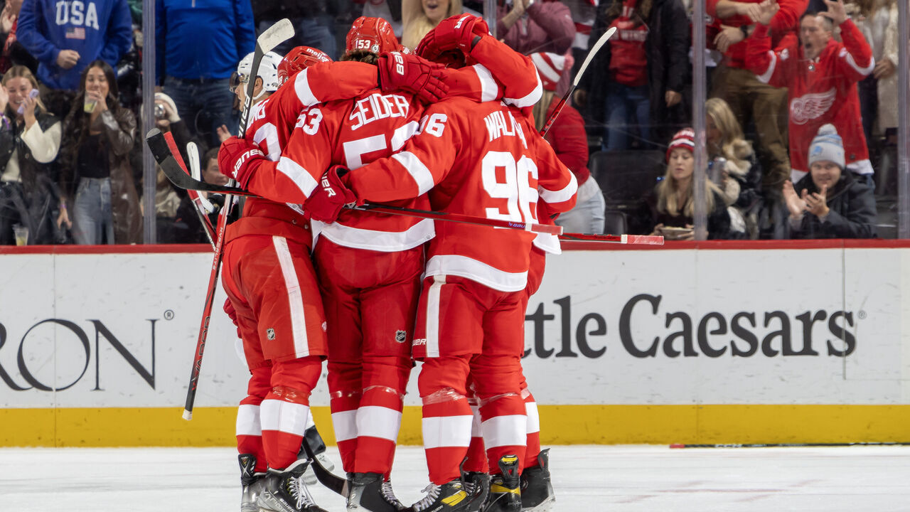 DETROIT, MI - NOVEMBER 04: Jake Walman #96 of the Detroit Red Wings celebrates his goal against the Boston Bruins with teammates during the second period at Little Caesars Arena on November 4, 2023 in Detroit, Michigan.