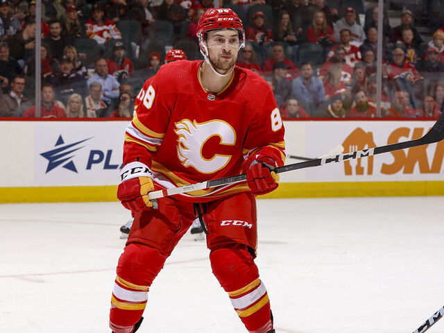 CALGARY, AB - OCTOBER 24: Andrew Mangiapane #88 of the Calgary Flames skates up ice against the New York Rangers at Scotiabank Saddledome on October 24, 2023 in Calgary, Alberta, Canada.