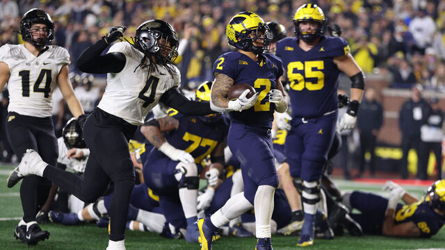 ANN ARBOR, MICHIGAN - NOVEMBER 04: Blake Corum #2 of the Michigan Wolverines scores a second half touchdown against the Purdue Boilermakers at Michigan Stadium on November 04, 2023 in Ann Arbor, Michigan. Michigan won the game 41-13.