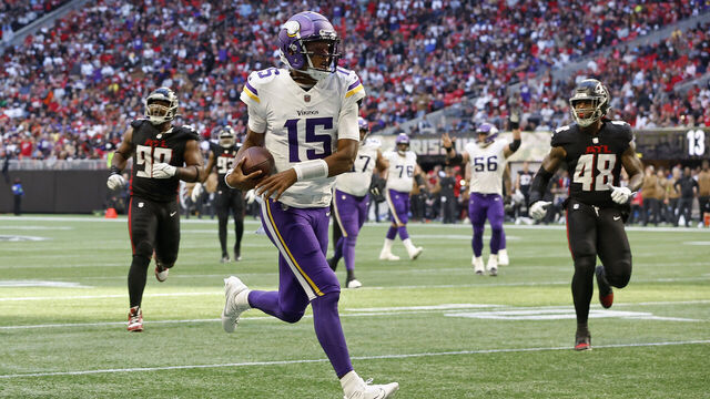 ATLANTA, GEORGIA - NOVEMBER 05: Joshua Dobbs #15 of the Minnesota Vikings runs the ball in for a touchdown during the third quarter of the game against the Atlanta Falcons at Mercedes-Benz Stadium on November 05, 2023 in Atlanta, Georgia.