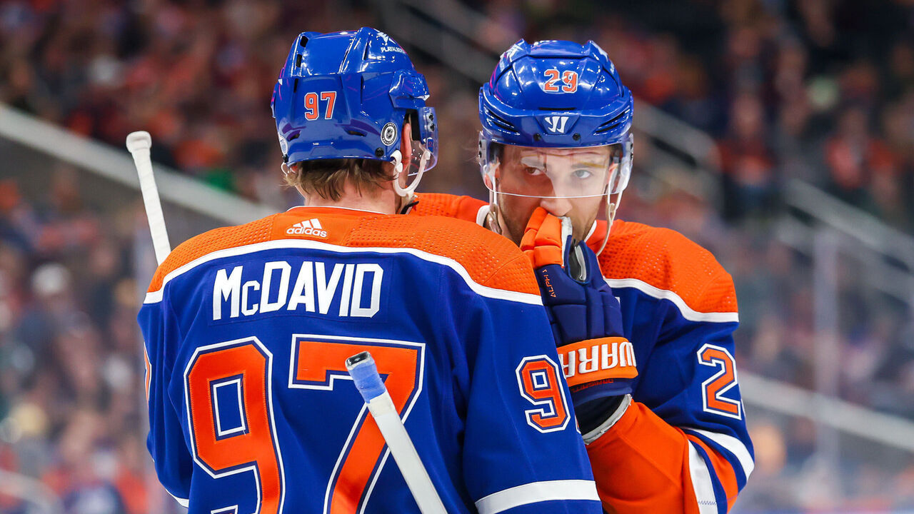 EDMONTON, CANADA - NOVEMBER 04: Connor McDavid #97 and Leon Draisaitl #29 of the Edmonton Oilers discuss strategy during a first period stoppage of play against the Nashville Predators at Rogers Place on November 04, 2023 in Edmonton, Alberta, Canada.