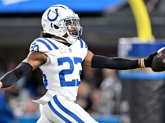CHARLOTTE, NORTH CAROLINA - NOVEMBER 05: Kenny Moore II #23 of the Indianapolis Colts celebrates after intercepting a pass and scoring a touchdown during the second quarter of the game against the Carolina Panthers at Bank of America Stadium on November 05, 2023 in Charlotte, North Carolina.