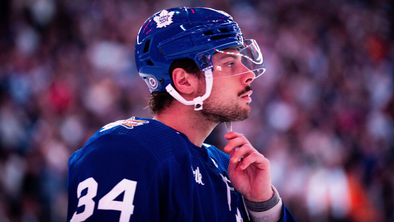 TORONTO, ON - OCTOBER 16: Auston Matthews #34 of the Toronto Maple Leafs puts on his helmet strap before a game against Chicago Blackhawks at the Scotiabank Arena on October 16, 2023 in Toronto, Ontario, Canada.