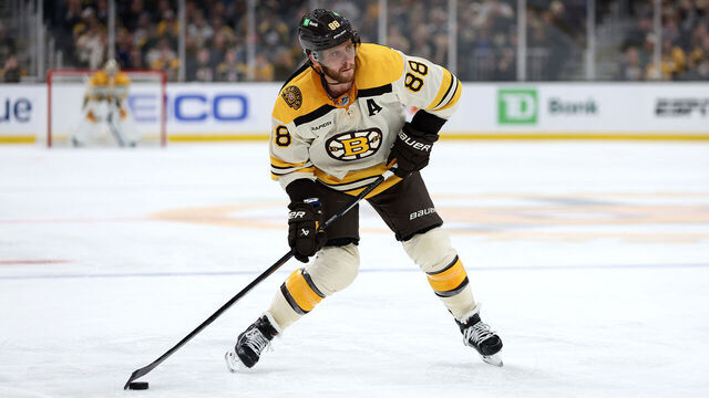 BOSTON, MASSACHUSETTS - NOVEMBER 02: David Pastrnak #88 of the Boston Bruins takes a shot against the Toronto Maple Leafs during the third period at TD Garden on November 02, 2023 in Boston, Massachusetts. The Bruins defeat the Maple Leafs 3-2 in overtime.