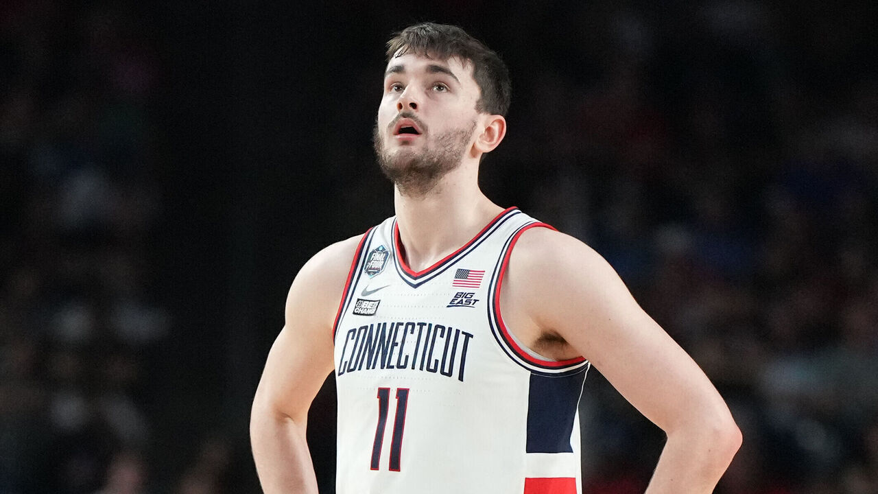 HOUSTON, TEXAS - APRIL 03: Alex Karaban #11 of the Connecticut Huskies looks on during the NCAA Men's Basketball Tournament Final Four championship game against the San Diego State Aztecs at NRG Stadium on April 03, 2023 in Houston, Texas.