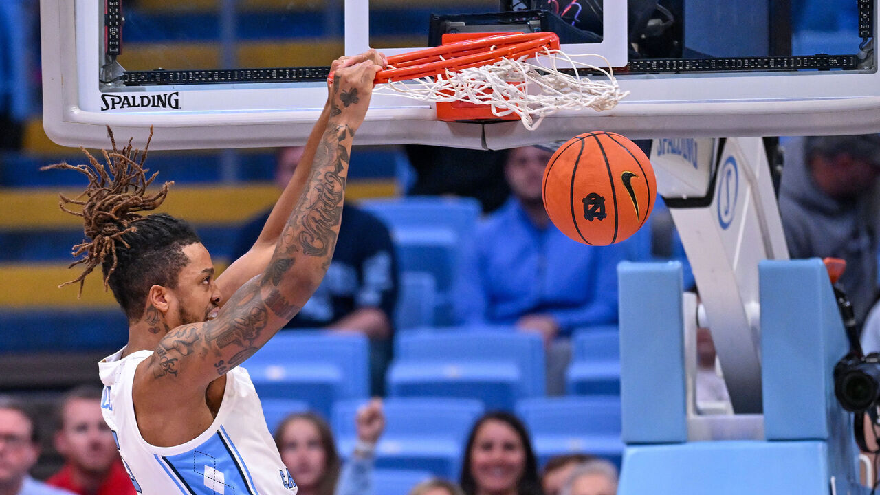 CHAPEL HILL, NORTH CAROLINA - NOVEMBER 06: Armando Bacot #5 of the North Carolina Tar Heels dunks against the Radford Highlanders during the first half of the game at the Dean E. Smith Center on November 06, 2023 in Chapel Hill, North Carolina.