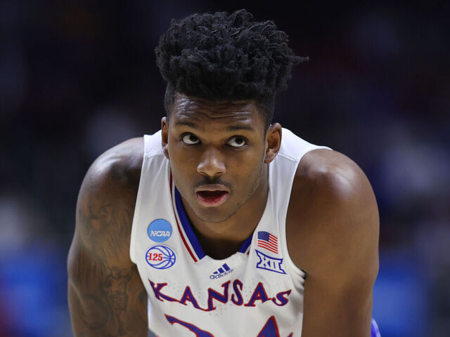 DES MOINES, IOWA - MARCH 18: K.J. Adams Jr. #24 of the Kansas Jayhawks looks on against the Arkansas Razorbacks during the second half in the second round of the NCAA Men's Basketball Tournament at Wells Fargo Arena on March 18, 2023 in Des Moines, Iowa.