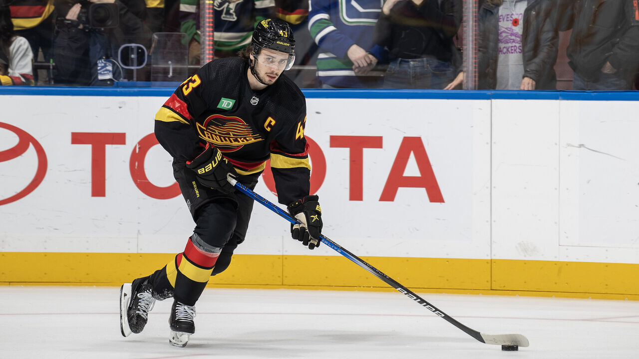 VANCOUVER, CANADA - NOVEMBER 6: Quinn Hughes #43 of the Vancouver Canucks skates up the ice during warm up before their NHL game against the Edmonton Oilers at Rogers Arena on November 6, 2023 in Vancouver, British Columbia, Canada.