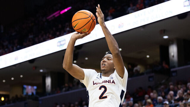 CHARLOTTESVILLE, VIRGINIA - NOVEMBER 06: Reece Beekman #2 of the Virginia Cavaliers shoots over Izzy Miles #0 of the Tarleton State Texans in the second half during a game at John Paul Jones Arena on November 6, 2023 in Charlottesville, Virginia.