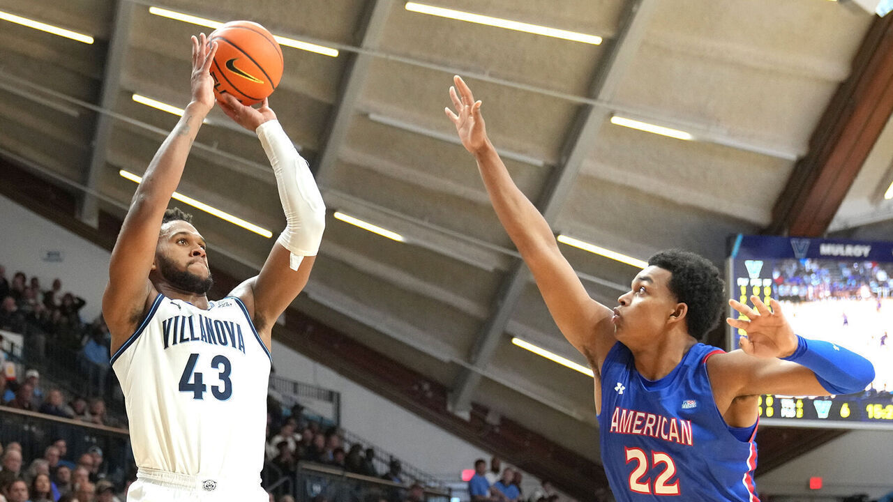 VILLANOVA, PA - NOVEMBER 06: Eric Dixon #43 of the Villanova Wildcats takes a jump shot over Jermaine Ballisager Webb #22 of the American University Eagles in the first half during a college basketball game at Finneran Pavilion on November 6, 2023 in Villanova, Pennsylvania.