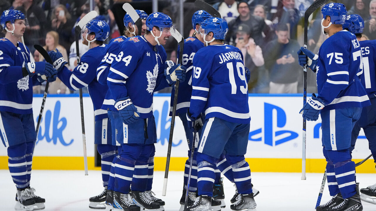TORONTO, CANADA - NOVEMBER 6: Auston Matthews #34 and Calle Jarnkrok #19 of the Toronto Maple Leafs celebrate defeating the Tampa Bay Lightning at Scotiabank Arena on November 6, 2023 in Toronto, Ontario, Canada.