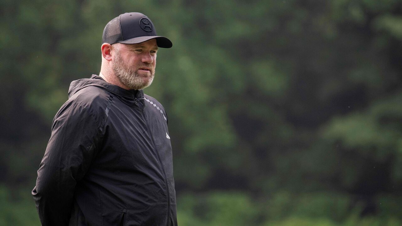 Wayne Rooney, Major League Soccer (MLS) All Stars Coach and current DC United Coach, walks on the pitch during a Major League Soccer (MLS) All Stars training session at American University in Washington, DC, on July 17, 2023. The MLS All Stars will play a friendly match against English Premier League's Arsenal FC on July 19, 2023.