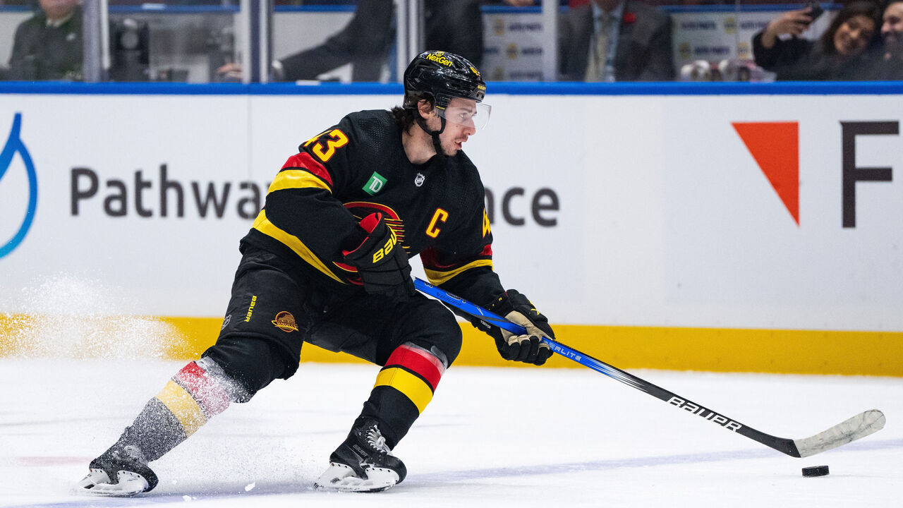 VANCOUVER, BC - OCTOBER 31: Vancouver Canucks defenseman Quinn Hughes (43) skates with the puck the Vancouver Canucks game versus the Nashville Predators on October 31, 2023, at Rogers Arena in Vancouver, B.C.