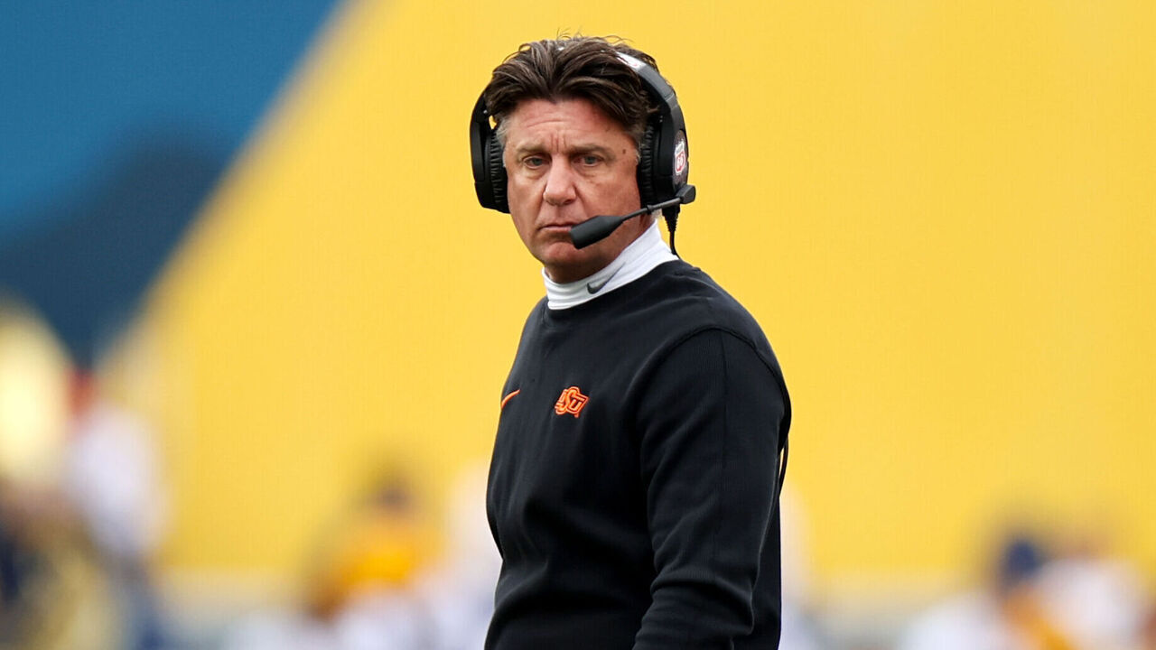 MORGANTOWN, WV - OCTOBER 21: Oklahoma State Cowboys head coach Mike Gundy on the sideline during the first quarter of the college football game between the Oklahoma State Cowboys and the West Virginia Mountaineers on October 21, 2023, at Mountaineer Field at Milan Puskar Stadium in Morgantown, WV.