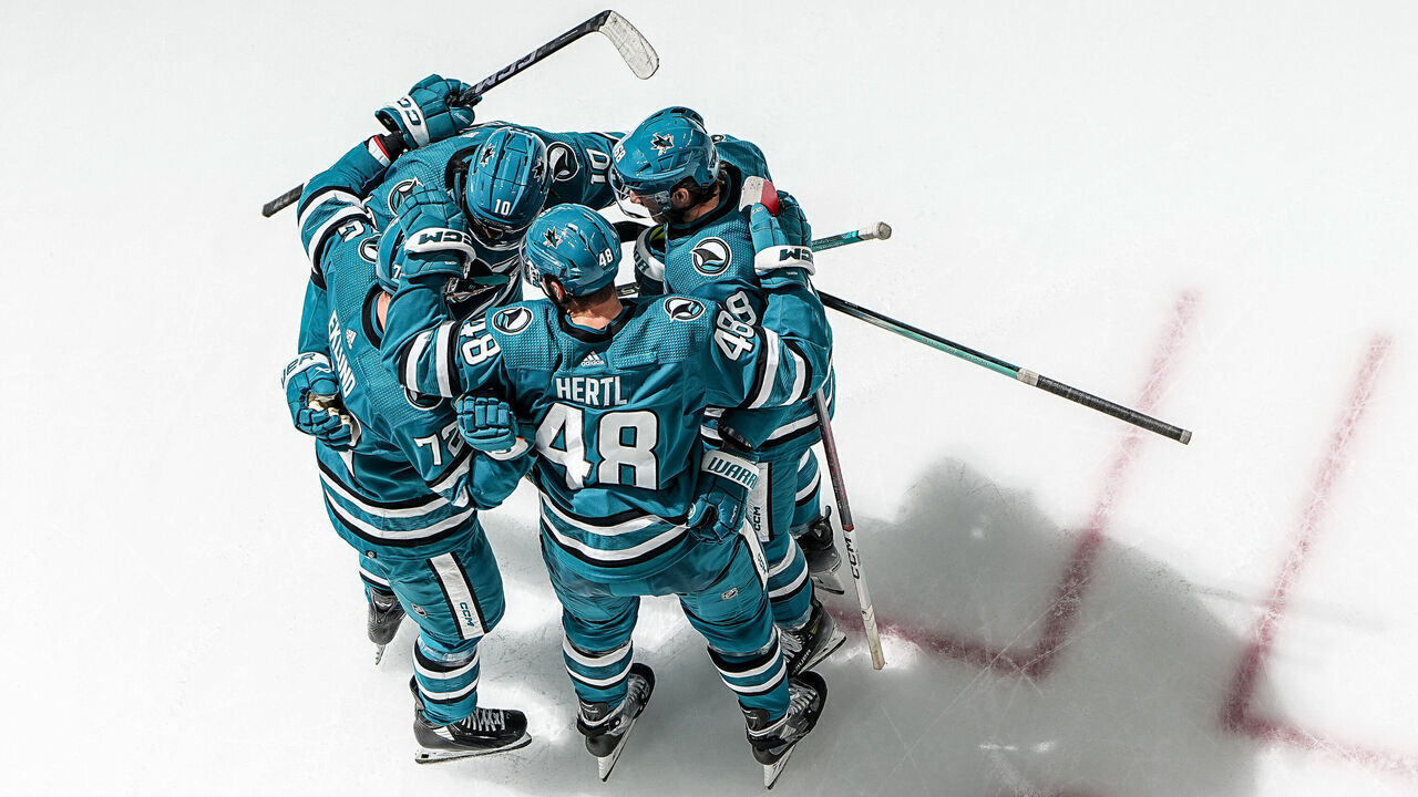SAN JOSE, CALIFORNIA - NOVEMBER 7: An overhead shot of William Eklund #72 of the San Jose Sharks celebrating a goal with teammates against the Philadelphia Flyers at SAP Center on November 7, 2023 in San Jose, California.