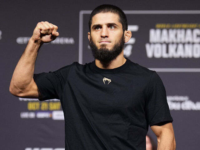 ABU DHABI, UNITED ARAB EMIRATES - OCTOBER 20: Islam Makhachev of Russia poses on the scale during the UFC 294 ceremonial weigh-in at Etihad Arena on October 20, 2023 in Abu Dhabi, United Arab Emirates.