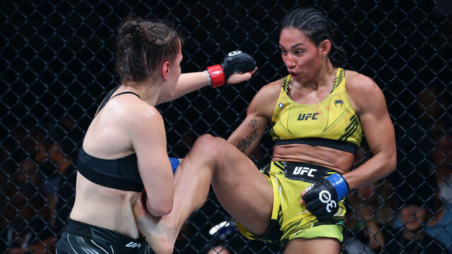 SINGAPORE, SINGAPORE - AUGUST 26: (R-L) Taila Santos of Brazil battles Erin Blanchfield in a flyweight bout during the UFC Fight Night event at Singapore Indoor Stadium on August 26, 2023 in Singapore.