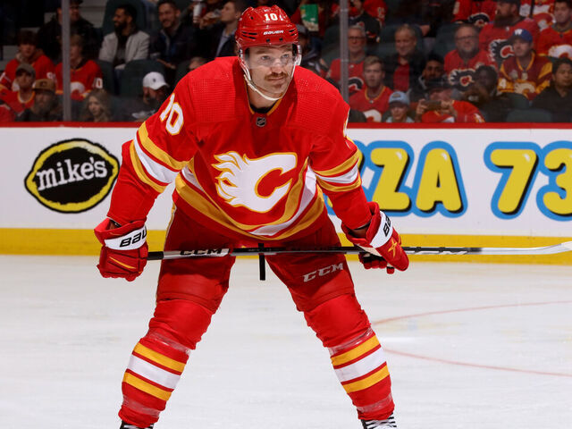 CALGARY, AB - NOVEMBER 7: Jonathan Huberdeau #10 of the Calgary Flames prepares for a face off against the Nashville Predators at Scotiabank Saddledome on November 7, 2023 in Calgary, Alberta, Canada.