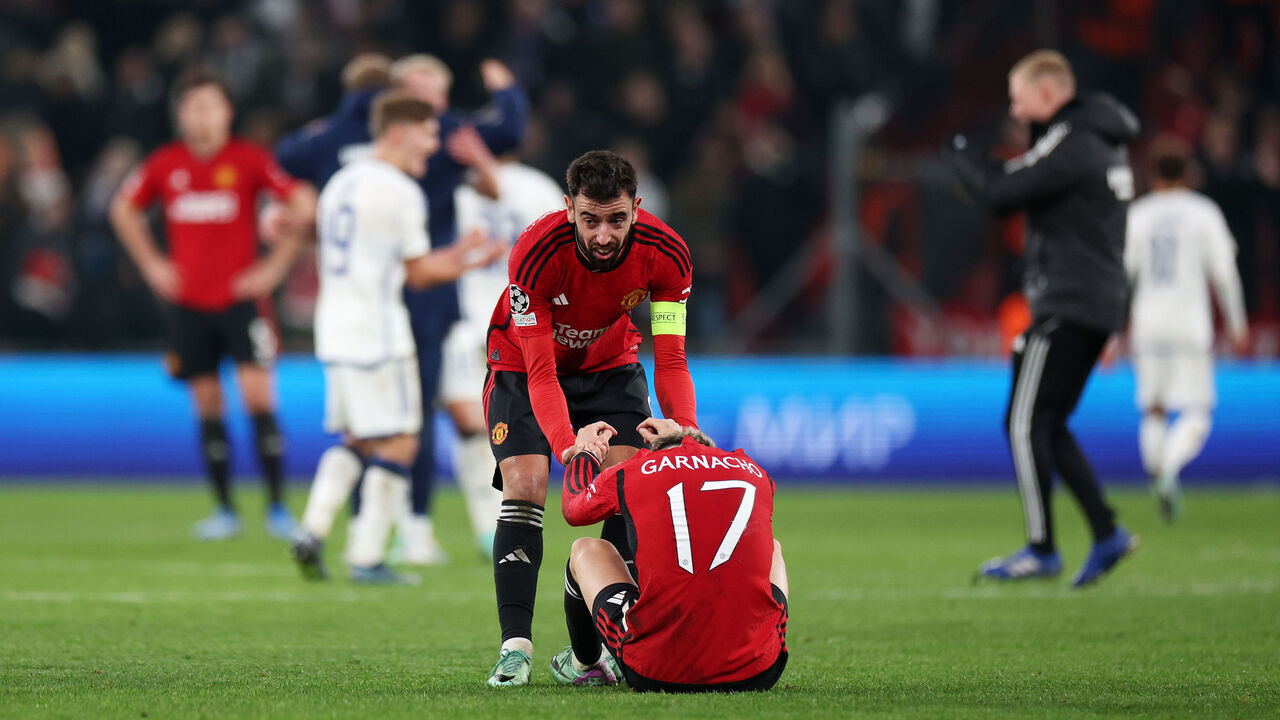 COPENHAGEN, DENMARK - NOVEMBER 08: Bruno Fernandes (L) and Alejandro Garnacho of Manchester United look dejected following the team's defeat during the UEFA Champions League match between F.C. Copenhagen and Manchester United at Parken Stadium on November 08, 2023 in Copenhagen, Denmark.
