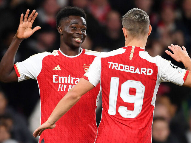 LONDON, ENGLAND - NOVEMBER 08: Bukayo Saka of Arsenal celebrates with teammate Leandro Trossard after scoring the team's second goal during the UEFA Champions League match between Arsenal FC and Sevilla FC at Emirates Stadium on November 08, 2023 in London, England.