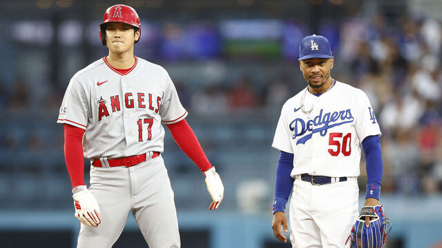 LOS ANGELES, CALIFORNIA - JULY 07: Mookie Betts #50 of the Los Angeles Dodgers and Shohei Ohtani #17 of the Los Angeles Angels in the fourth inning at Dodger Stadium on July 07, 2023 in Los Angeles, California.