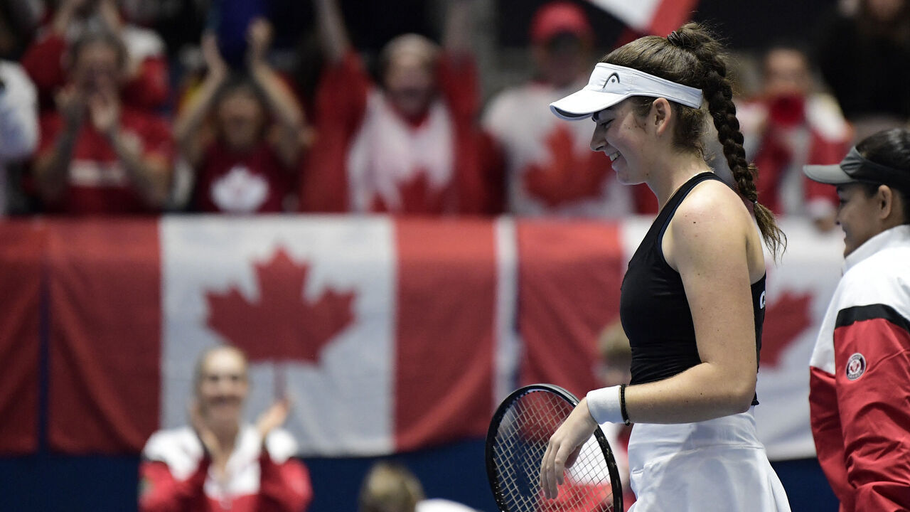 Canada's Marina Stakusic celebrates beating Spain's Rebeka Masarova during the group stage group C singles tennis match between Spain and Canada on the day 2 of the Billie Jean King Cup Finals 2023 in La Cartuja stadium in Seville on November 8, 2023.