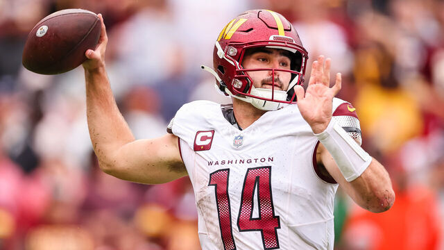 LANDOVER, MD - SEPTEMBER 10: Sam Howell #14 of the Washington Commanders attempts a pass against the Arizona Cardinals during the second half of the game at FedExField on September 10, 2023 in Landover, Maryland.