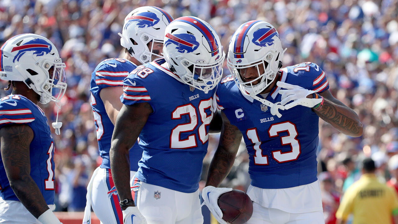 ORCHARD PARK, NEW YORK - OCTOBER 01: Latavius Murray #28 and Gabe Davis #13 of the Buffalo Bills celebrate after scoring a touchdown during the first quarter against the Miami Dolphins at Highmark Stadium on October 01, 2023 in Orchard Park, New York.