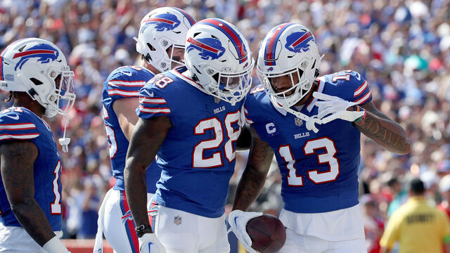 ORCHARD PARK, NEW YORK - OCTOBER 01: Latavius Murray #28 and Gabe Davis #13 of the Buffalo Bills celebrate after scoring a touchdown during the first quarter against the Miami Dolphins at Highmark Stadium on October 01, 2023 in Orchard Park, New York.