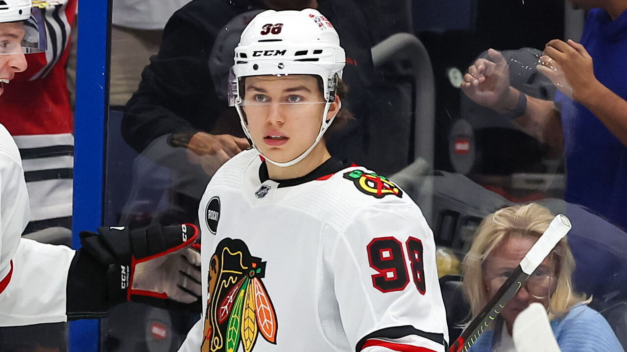 TAMPA, FL - NOVEMBER 09: Kevin Korchinski #55 of the Chicago Blackhawks, left, congratulates Connor Bedard #98 on his second goal against the Tampa Bay Lightning during the first period at the Amalie Arena on November 9, 2023 in Tampa, Florida.