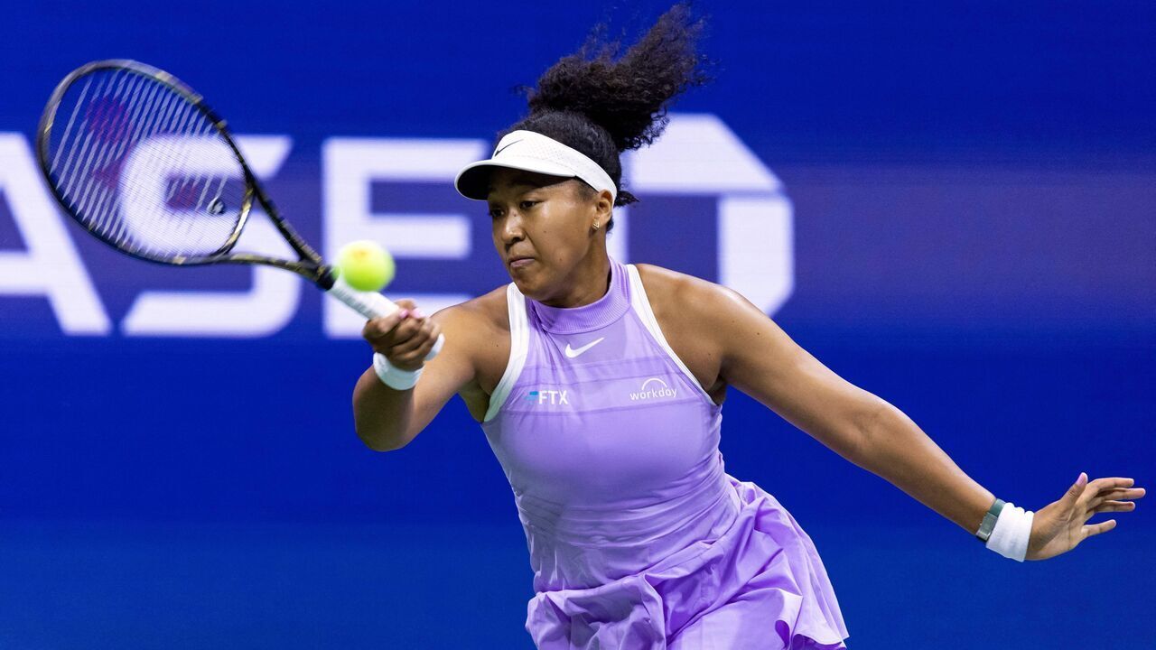 Japan's Naomi Osaka hits a return to USA's Danielle Collins during their 2022 US Open Tennis tournament women's singles first round match at the USTA Billie Jean King National Tennis Center in New York, on August 30, 2022.