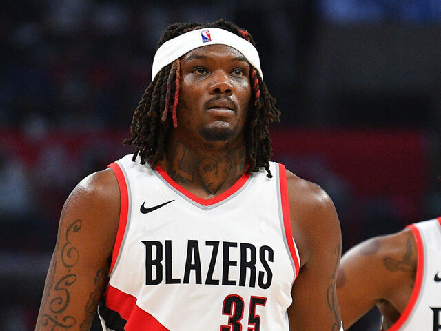 LOS ANGELES, CA - OCTOBER 25: Portland Trail Blazers center Robert Williams III (35) and Portland Trail Blazers forward Jerami Grant (9) look on during a NBA game between the Denver Nuggets and the Portland Trail Blazers on October 25, 2023 at Crypto.com Arena in Los Angeles, CA.