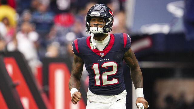 HOUSTON, TX - OCTOBER 15: Nico Collins #12 of the Houston Texans runs out of the tunnel prior to an NFL football game against the New Orleans Saints at NRG Stadium on October 15, 2023 in Houston, Texas.