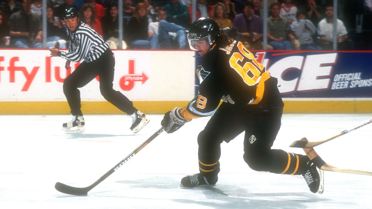 LANDOVER, MD - JANUARY 01: Jaromir Jagr #66 of the Pittsburgh Penguins skates with the puck during a NHL hockey game against the Washington Capitals on January 1, 1996 at USAir Arena in Landover, Maryland.