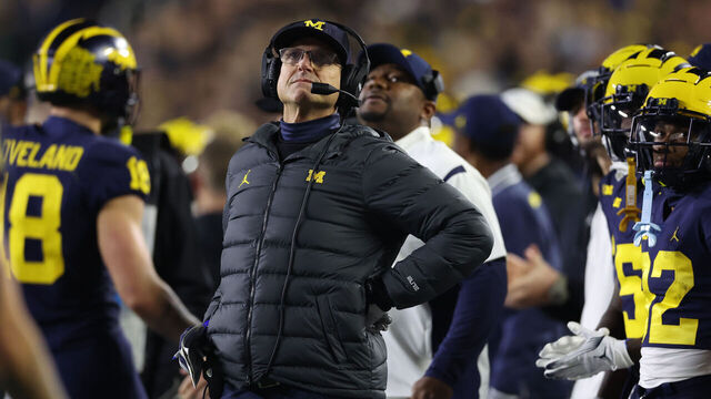 ANN ARBOR, MICHIGAN - NOVEMBER 04: Head coach Jim Harbaugh of the Michigan Wolverines looks on in the first half while playing the Purdue Boilermakers at Michigan Stadium on November 04, 2023 in Ann Arbor, Michigan.
