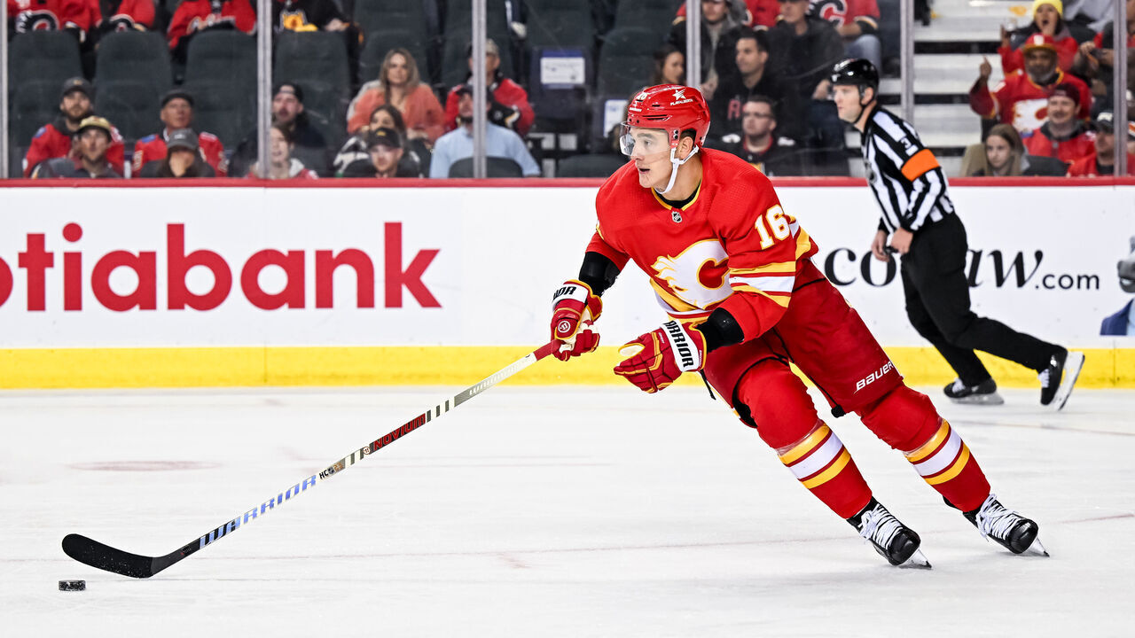 CALGARY, AB - NOVEMBER 07: Calgary Flames Defenceman Nikita Zadorov (16) skates with the puck during the second period of an NHL game between the Calgary Flames and the Nashville Predators on November 7, 2023, at the Scotiabank Saddledome in Calgary, AB.