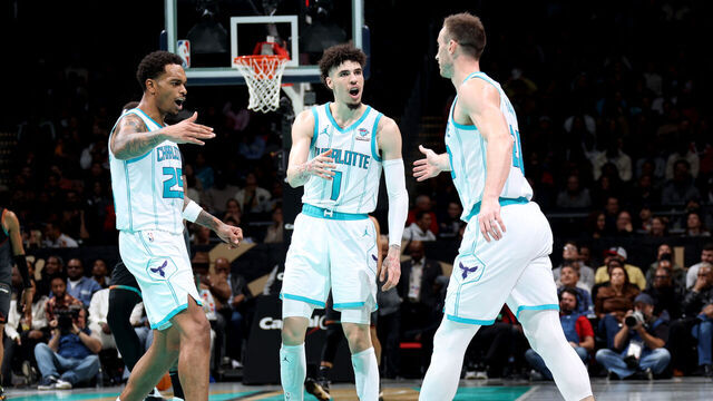 WASHINGTON, DC - NOVEMBER 10: P.J. Washington #25 of the Charlotte Hornets, LaMelo Ball #1 of the Charlotte Hornets and Gordon Hayward #20 of the Charlotte Hornets high five during the game against the Washington Wizards during the In-Season Tournament on November 10, 2023 at Capital One Arena in Washington, DC. Mandatory Copyright Notice: Copyright 2023 NBAE