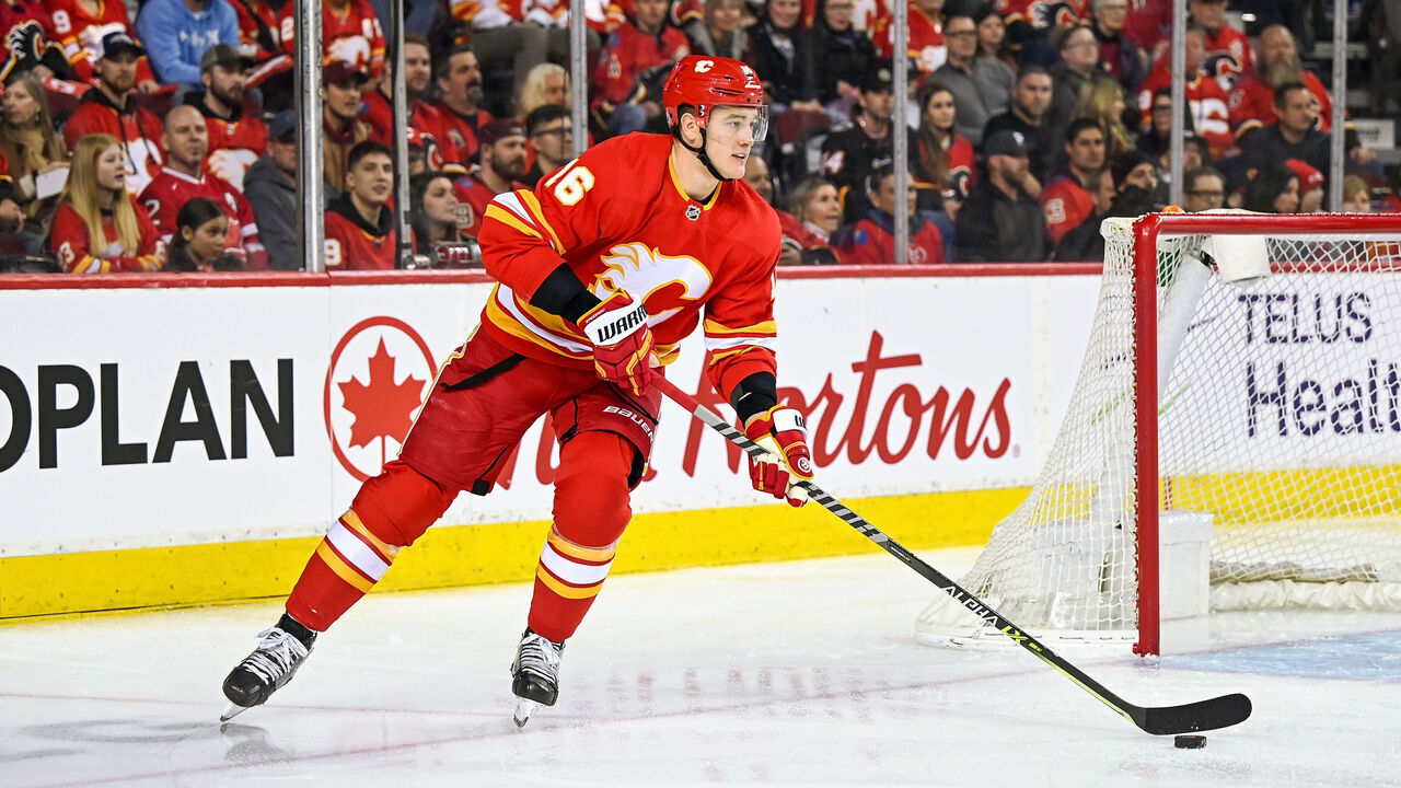 CALGARY, AB - APRIL 23: Calgary Flames Defenceman Nikita Zadorov (16) skates with the puck during the first period of an NHL game where the Calgary Flames hosted the Vancouver Canucks on April 23, 2022, at the Scotiabank Saddledome in Calgary, AB.