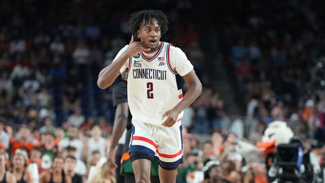HOUSTON, TEXAS - APRIL 01: Tristen Newton #2 of the Connecticut Huskies celebrates a shot during the NCAA Men's Basketball Tournament Final Four semifinal game against the Miami (Fl) Hurricanes at NRG Stadium on April 01, 2023 in Houston, Texas.
