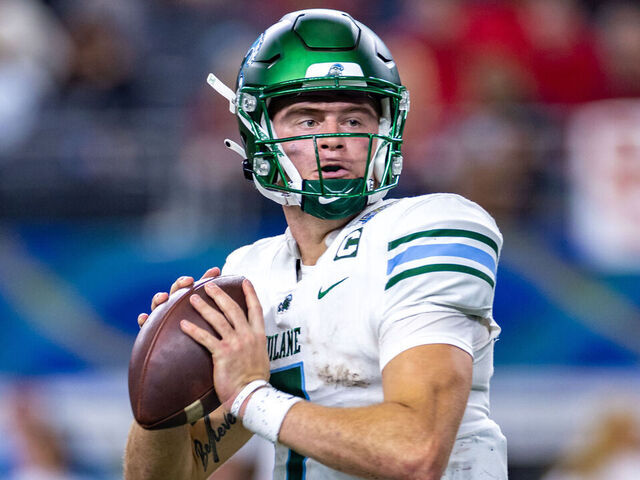ARLINGTON, TX - JANUARY 02: Tulane Green Wave quarterback Michael Pratt (#7) throws a pass during the Goodyear Cotton Bowl game between the USC Trojans and Tulane Green Wave on January 02, 2023 at AT&T Stadium in Arlington, TX.