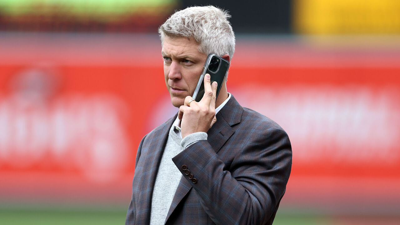 BALTIMORE, MARYLAND - APRIL 08: Baltimore Orioles general manager Mike Elias talks on the phone before the start of the Orioles and New York Yankees game at Oriole Park at Camden Yards on April 08, 2023 in Baltimore, Maryland.