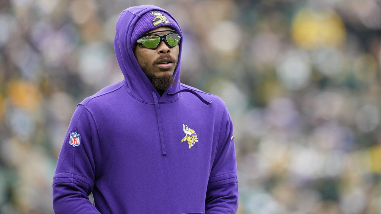 GREEN BAY, WISCONSIN - OCTOBER 29: Justin Jefferson #18 of the Minnesota Vikings looks on prior to the game against the Green Bay Packers at Lambeau Field on October 29, 2023 in Green Bay, Wisconsin.