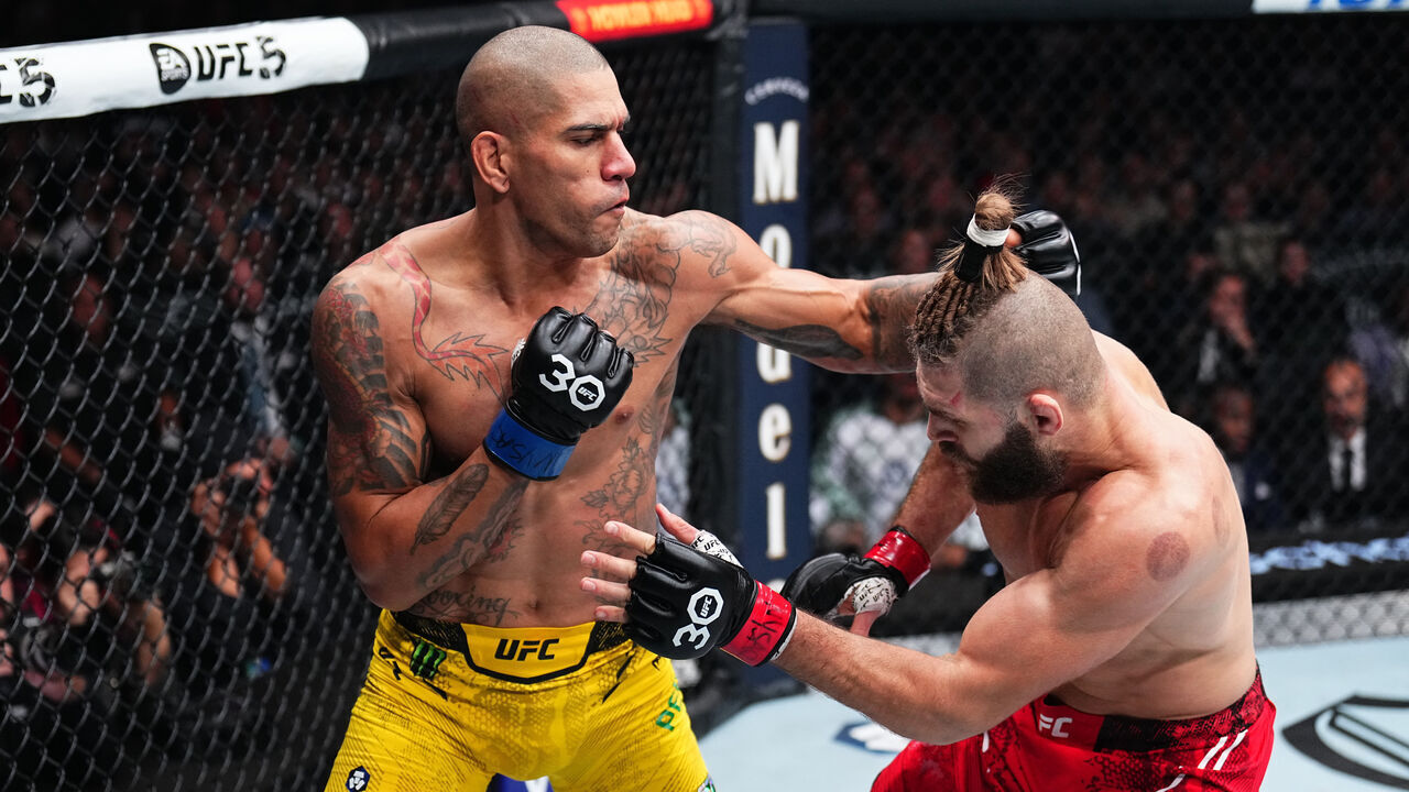 NEW YORK, NEW YORK - NOVEMBER 11: Alex Pereira of Brazil punches Jiri Prochazka of the Czech Republic in the UFC light heavyweight championship fight during the UFC 295 event at Madison Square Garden on November 11, 2023 in New York City.