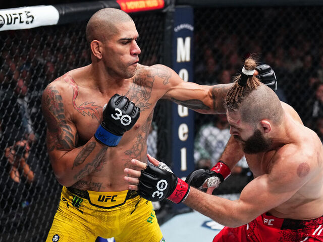 NEW YORK, NEW YORK - NOVEMBER 11: Alex Pereira of Brazil punches Jiri Prochazka of the Czech Republic in the UFC light heavyweight championship fight during the UFC 295 event at Madison Square Garden on November 11, 2023 in New York City.