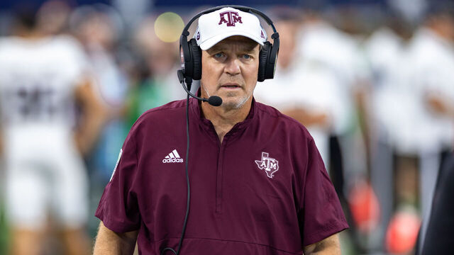 ARLINGTON, TX - SEPTEMBER 30: Texas A&M Aggies head coach Jimbo Fisher walks up field during the Southwest Classic college football game between the Texas A&M Aggies and the Arkansas Razorbacks on September 30, 2023 at AT&T Stadium in Arlington, TX.