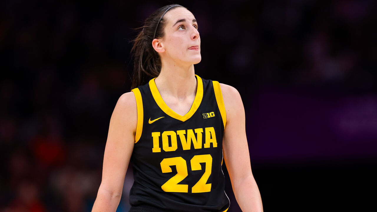 CHARLOTTE, NC - NOVEMBER 09: Caitlin Clark #22 of the Iowa Hawkeyes looks at the scoreboard during the Ally Tipoff against the Virginia Tech Hokies at Spectrum Center in Charlotte, North Carolina on Nov 9, 2023.