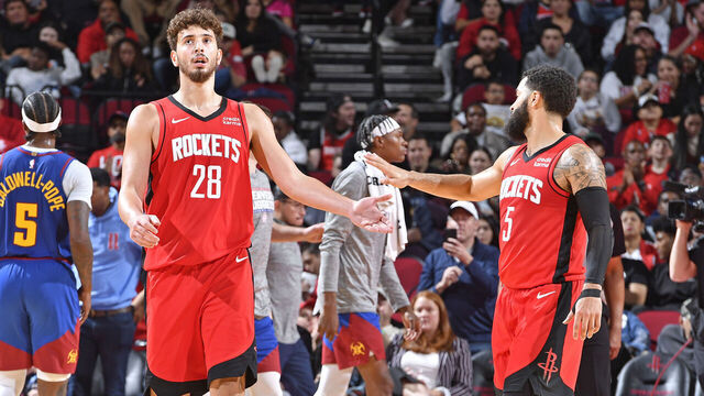 HOUSTON, TX - NOVEMBER 12: Alperen Sengun #28 and Fred VanVleet #5 of the Houston Rockets high five during the game against the Denver Nuggets on November 12, 2023 at the Toyota Center in Houston, Texas. Mandatory Copyright Notice: Copyright 2023 NBAE