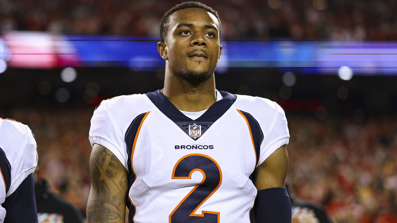 KANSAS CITY, MO - OCTOBER 12: Pat Surtain II #2 of the Denver Broncos looks on from the sideline during the national anthem prior to an NFL football game against the Kansas City Chiefs at GEHA Field at Arrowhead Stadium on October 12, 2023 in Kansas City, Missouri.