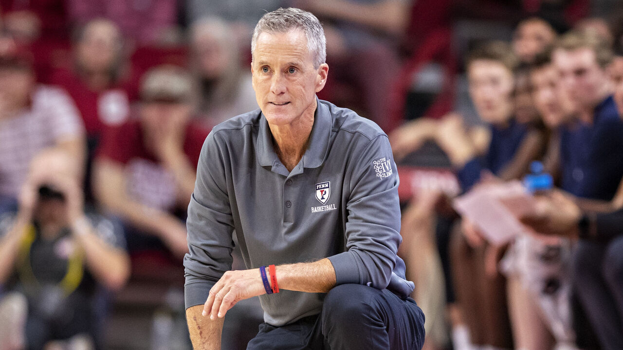 FAYETTEVILLE, ARKANSAS - NOVEMBER 28: Head Coach Steve Donahue of the Pennsylvania Quakers watches his team during a game against the Arkansas Razorbacks at Bud Walton Arena on November 28, 2021 in Fayetteville, Arkansas.
