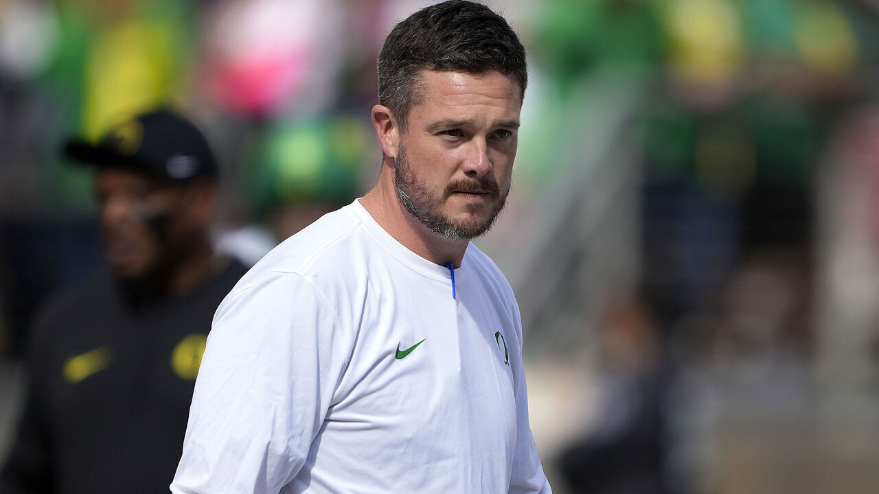 STANFORD, CALIFORNIA - SEPTEMBER 30: Head coach Dan Lanning of the Oregon Ducks looks on while his team warms up prior to playin the Stanford Cardinal in an NCAA football game at Stanford Stadium on September 30, 2023 in Stanford, California.